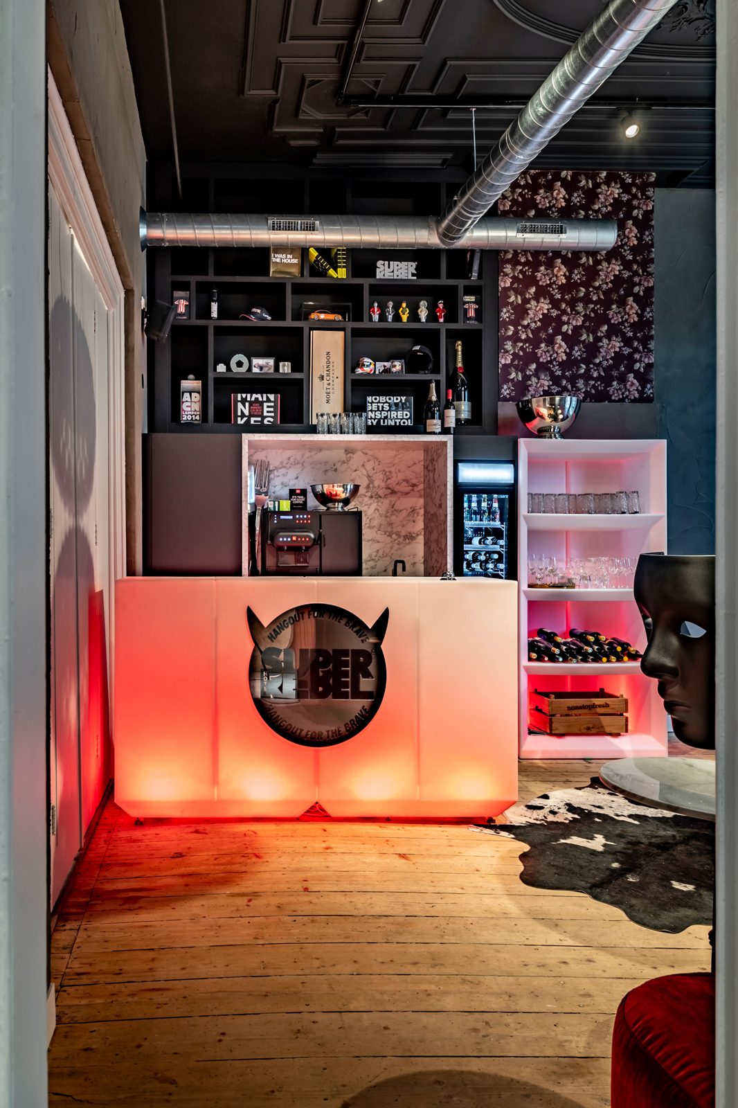 Illuminated red bar at Hotel SuperRebel